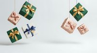 Wrapped gift boxes in green and rose gold with gold and blue ribbons suspended against white background for holiday celebrations.