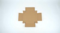 Cardboard cross shape template isolated on white background for packaging design and craft projects.