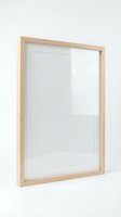 Empty wooden picture frame with glass and white mat on neutral background for home decor and art display mockup.