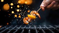 Grilled shrimp skewer with lemon and spices floating in dark atmosphere with bokeh lights and steam, dramatic food photography with motion capture effect.