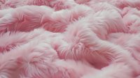 Soft pink fluffy faux fur texture background with delicate wavy pattern. Luxurious plush fabric surface creates cozy and gentle atmosphere for fashion and interior design.