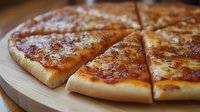 Freshly baked cheese pizza slices on wooden cutting board, crispy crust with melted mozzarella and tomato sauce, close-up view showing texture and toppings.