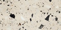 Terrazzo texture with black and dark gray stone fragments scattered on light beige background, modern architectural surface pattern for interior design projects.