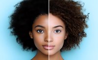 Young African American woman's face split in half showing natural curly afro hair texture on one side and digitally smoothed skin and hair on other against blue background.