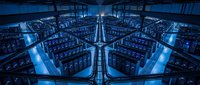 Futuristic data center with rows of servers in blue lighting, modern technology infrastructure for cloud computing and digital storage solutions.