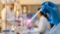 Healthcare professional in blue gloves holding test tube with digital molecular structure overlay in modern laboratory for medical research and analysis.