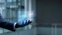 Businessman hand presenting holographic digital interface with data analytics and futuristic technology in modern office environment for business presentations.