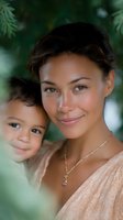 Mixed race mother and young son share tender moment outdoors, framed by soft green foliage. Natural lighting highlights warm skin tones and genuine expressions.