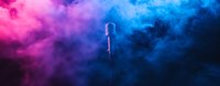 Glowing microphone silhouette against dramatic pink and blue smoke background creates atmospheric mood for music, entertainment and performance concepts.