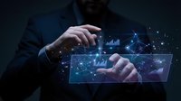 Businessman hands touching holographic digital interface with network connections and data visualization in dark blue technology concept.