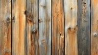 Rustic wooden fence planks with natural weathered patina showing knots, grain texture and varying shades of brown and gray, creating organic pattern.