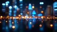 Dreamy urban nightscape with glowing blue and orange bokeh lights reflecting on water surface creating magical atmosphere for background designs.