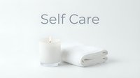 Minimalist self care concept with white candle and folded towel on light background, text Self Care, spa wellness lifestyle.