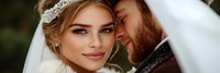 Young couple on wedding day, groom with beard kissing bride's cheek under veil, romantic moment for marriage, love and celebration themes.
