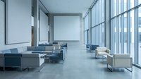 Modern minimalist office lobby with floor-to-ceiling windows, contemporary furniture and natural light creating professional corporate atmosphere.