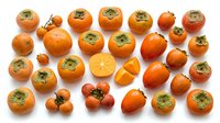 Fresh ripe persimmon fruits collection isolated on white background showing whole and sliced orange seasonal produce for healthy eating and cooking.