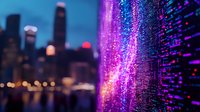 Futuristic digital technology wall with glowing purple and pink light effects against blurred urban cityscape background at night, showcasing modern data visualization.