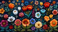 Colorful blooming flowers, tulips, daisies and wildflowers on dark background creates whimsical garden composition.