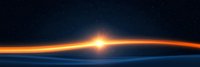 Dramatic sunrise over curved horizon line with glowing orange light streak against dark starry space background, creating ethereal atmospheric phenomenon.