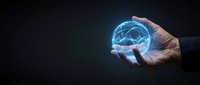 Businessman hand holding glowing digital brain hologram with neural network connections on dark background for artificial intelligence and technology concepts.