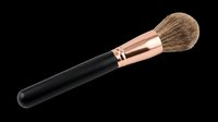 Makeup powder brush with rose gold ferrule and black handle, isolated on transparent background, ready for beauty clipart, stickers, t-shirt design, and print on demand.