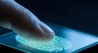 Finger touching digital fingerprint scanner on smartphone screen with blue glowing biometric authentication technology for secure access and identity verification.