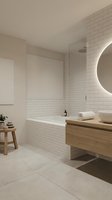 Modern minimalist bathroom interior with white subway tiles, floating wood vanity, round mirror and neutral beige tones for contemporary home design.