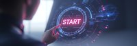 Hand touching futuristic holographic START button interface with glowing digital elements and data visualization for business technology concepts.