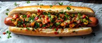 Grilled hot dog topped with fresh pico de gallo salsa, chopped cilantro and colorful bell peppers in toasted bun on white paper background.