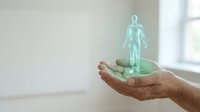 Holographic human anatomy skeleton projection floating above open palm in modern medical technology concept for healthcare innovation and digital medicine applications.