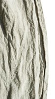 Crumpled beige linen fabric with natural wrinkles and folds, suitable for textile, fashion, and interior design backgrounds.
