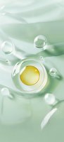 Transparent bubbles floating on mint green water surface with golden yellow sphere inside central bubble, creating ethereal cosmetic backdrop.
