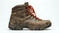 Worn hiking boot with orange laces and rugged sole, isolated on white background. Suitable for outdoor adventure, travel, and footwear design projects.