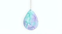 Watercolor teardrop pendant with soft turquoise and lavender gradient, isolated on white background, ready for jewelry design, fashion graphics, and product mockups.