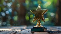 Golden star trophy award on wooden surface against blurred bokeh background, symbolizing achievement, recognition and success in competition or business.