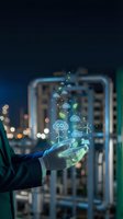 Businessman hand holding holographic carbon dioxide emissions and green energy icons with city skyline background for environmental sustainability concepts.