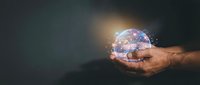 Hands holding glowing digital brain with neural network connections representing artificial intelligence, machine learning and futuristic technology concepts.