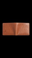 Open tan leather bifold wallet with stitched edges, isolated on transparent background, ready for t-shirt designs, sublimation, print-on-demand products, stickers, and clipart use.