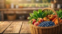 Wicker basket filled with fresh organic vegetables and berries on rustic wooden table in garden setting, suitable for farmers market, agriculture, and healthy eating content.