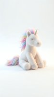 Soft plush unicorn toy with white body and rainbow-colored mane and tail, isolated on white background, suitable for children's product design and merchandise.