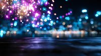 Vibrant fireworks display reflecting on dark water surface with blurred city lights creating magical bokeh effect in purple and blue tones.