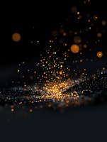 Magical golden glitter particles and bokeh lights scattered on dark background create atmospheric festive mood for holiday designs and celebrations.