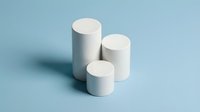 White cylindrical geometric shapes in ascending height arrangement on soft blue background for modern minimalist design and product display.