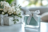 Elegant glass perfume bottle with white satin bow next to white roses bouquet on bright surface. Luxury fragrance and floral composition for beauty product marketing.