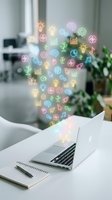 Laptop displaying colorful neon icons representing innovation, creativity, and business ideas floating above keyboard in modern office workspace with blurred background and plant.