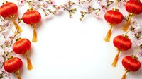 Red lanterns with golden tassels and cherry blossom branches create festive frame on white background for lunar new year celebration and spring festival.