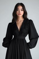 Young Asian woman in elegant black dress with lace bodice and balloon sleeves poses against light gray background, showcasing dramatic fashion portrait style.