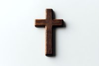 Wooden cross on white background, rustic religious symbol with natural wood grain texture and shadow detail, isolated for faith-based designs and layouts.