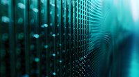 Abstract turquoise mesh pattern with selective focus creating depth effect, metallic grid structure in dark background with bokeh lights for technology concepts.