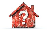 Red weathered house silhouette with white question mark symbol on grunge texture background, representing real estate uncertainty and housing market issues.